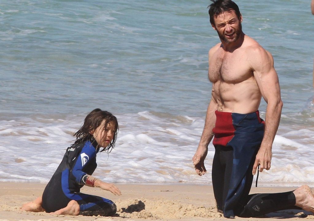 EXCLUSIVE TO INF. ALL-ROUNDER. September 22, 2012: Hugh Jackman and his family enjoy a sunny day at Bondi Beach in Sydney, Australia. Hugh Jackman was seen playing with daughter Ava & son Oscar in waves, teaching them how to body board., Image: 142343295, License: Rights-managed, Restrictions: EXCLUSIVE TO INF. ALL-ROUNDER., Model Release: no, Credit line: Profimedia, INF