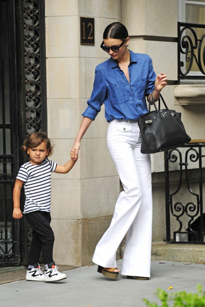 122126, EXCLUSIVE: Miranda Kerr holds her son Flyn's hand while coming out of their apartment on the Upper East Side in NYC. New York, New York - Thursday July 3, 2014., Image: 198057793, License: Rights-managed, Restrictions: , Model Release: no, Credit line: Profimedia, Pacific coast news