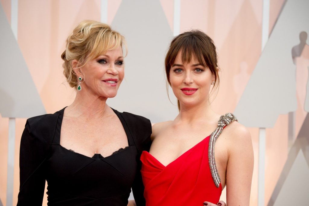 NOT FOR COVER USAGE. Actress Melanie Griffith with Oscar presenter, Dakota Johson, arrive for the live ABC Telecast of The 87th Oscars at the Dolby Theatre in Hollywood, CA on Sunday, February 22, 2015., Image: 231116782, License: Rights-managed, Restrictions: EDITORIAL USE ONLY. NO COVER USAGE. Camera Press provides this publicly distributed image for editorial purposes and is not the copyright owner. Additional permissions may be required and clearing such rights are the sole responsibility of the end user., Model Release: no, Credit line: Profimedia, TEMP Camerapress