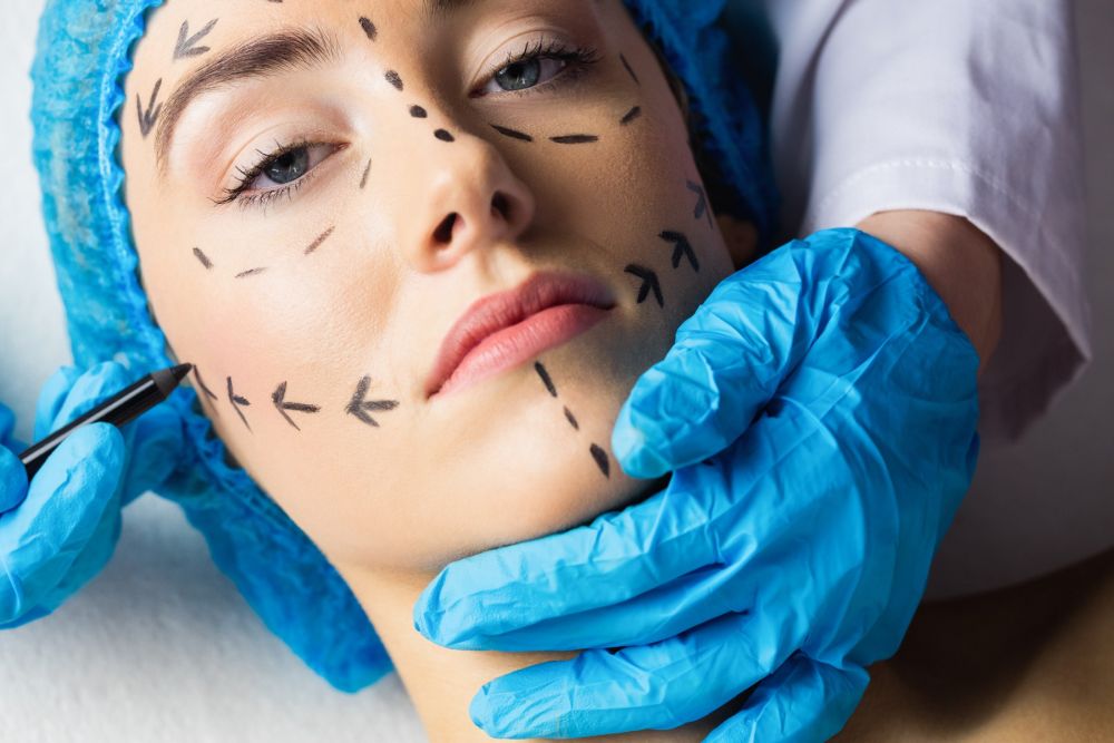 Peaceful young patient with dotted lines on the face in an examination room, Image: 290326376, License: Royalty-free, Restrictions: , Model Release: yes, Credit line: Profimedia, Wavebreak