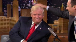 16 September 2016 - Los Angeles - USA **** STRICTLY NOT AVAILABLE FOR USA *** Donald Trump lets Jimmy Fallon mess up his infamous hairdo as he appears on The Tonight Show. The talk show host closed his segment with Trump by asking if he could do one silly thing with him since he could be President the next time he appears on the show. "I'm not liking the sound of this," Trump said before Fallon asked if he could mess his hair up. The audience roared as the Republican nominee took his time to answer - but he ultimately agreed. "The answer is yes but I hope the people of New Hampshire will understand," Trump said, noting he would be there later that evening and did not want his hair out of place.Fallon then leaned over and ruffled his hair for several seconds. And while Trump is known for being sensitive about his hair, he smiled throughout the hilarious ordeal. Afterwards, he tried to push his hair back in place but it remained sticking out in all directions. During the interview, Trump repeated his comments that he does not want a moderator at the debates and complained that critics of Today show host Matt Lauer are 'trying to game the system'. Trump went on to say the presidential campaign has been 'fun, amazing,' and that 'it's been an honor for me.'. When asked what he would say to children who wanted to grow up to be president he replied: "You want to help people," noting there are 'tremendous problems,' adding: "If you want to help people there's no better position to do it from than the Presidency." Fallon asked Trump if he had always wanted to be President with Trump:" No I really never did," before noting if he had he 'probably wouldn't have done as many shows'. Trump then went on to describe his run for president as 'grueling but at the same time very satisfying,' adding his background in business has helped him., Image: 300008880, License: Rights-managed, Restrictions: PLEASE CREDIT AS PER BYLINE *UK CLIENTS - PLEASE PIXELATE CHILDS FACE BEFORE PUBLICATION **UK CLIENTS MUST CALL PRIOR TO TV OR ONLINE USAGE, Model Release: no, Credit line: Profimedia, Xposurephotos
