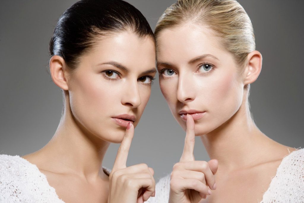 two young caucasian women gesturing shh - keep it secret, Image: 335949859, License: Royalty-free, Restrictions: , Model Release: yes, Credit line: Profimedia, Panthermedia