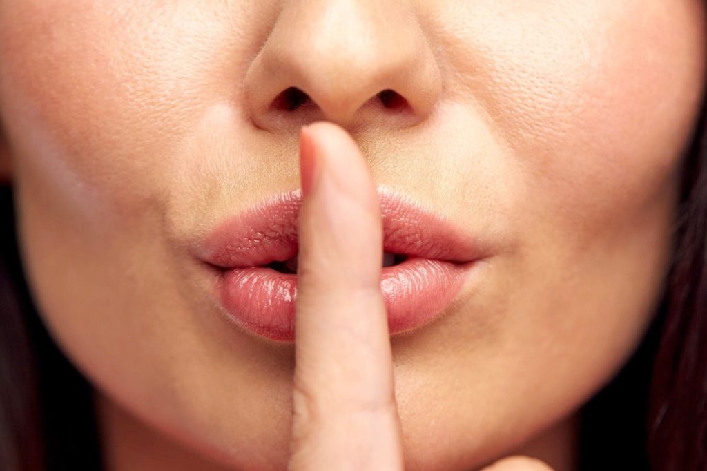 silence, gesture and beauty concept - close up of young woman holding finger on lips, Image: 269205461, License: Royalty-free, Restrictions: , Model Release: yes, Credit line: Profimedia, Alamy