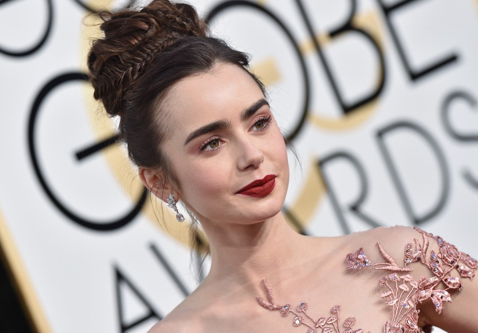 74th Annual Golden Globe Awards - Arrivals. The Beverly Hilton Hotel, Beverly Hills, CA. Pictured: Lily Collins. EVENT January 8, 2016 Job: 170108A2, Image: 310362078, License: Rights-managed, Restrictions: 000, Model Release: no, Credit line: Profimedia, Bauer Griffin