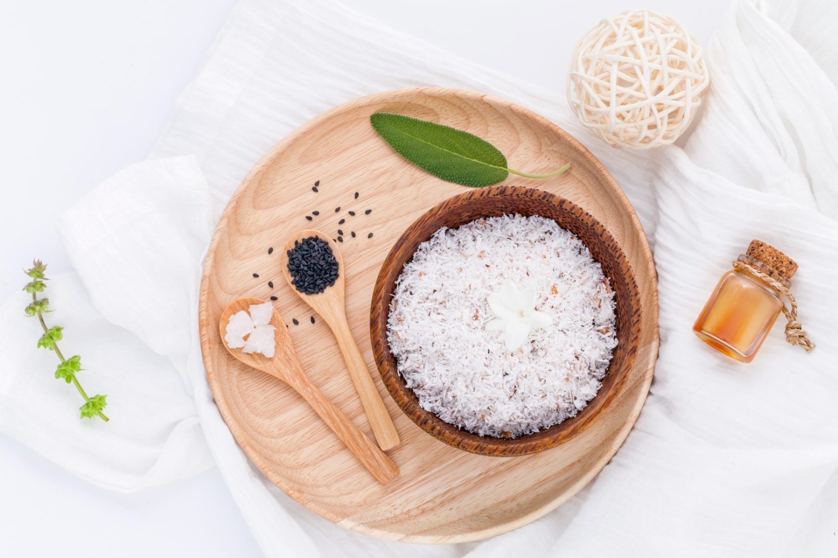 Raw coconut and coconut essential oils with sea salt and herbs natural spa Ingredients for scrub and skin care isolate on white background., Image: 319051547, License: Royalty-free, Restrictions: , Model Release: no, Credit line: Profimedia, Alamy