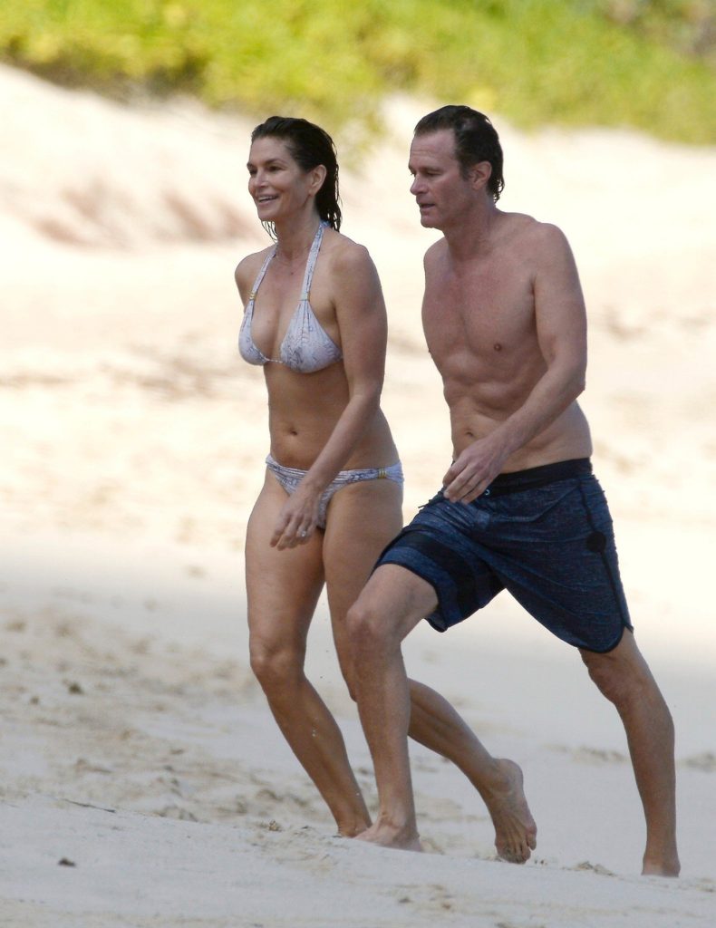 April 4th, 2017 - Saint Barts Cindy Crawford and her husband Rande Gerber enjoying the sun in the Caribbean sea. ****** BYLINE MUST READ : ©Spread Pictures ****** ****** No Web Usage before agreement ****** ******Please hide the children's faces prior to the publication****** ****** Stricly No Mobile Phone Application or Apps use without our Prior Agreement ****** Enquiries at photo@spreadpictures.com, Image: 327805127, License: Rights-managed, Restrictions: Worldwide, Model Release: no, Credit line: Profimedia, Spread Pictures