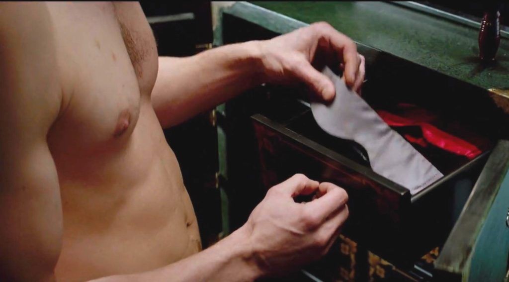 Ferrari Press Agency Ref 6347 Grey 1 25/07/2014 See Ferrari text Picture credit HereĹs a first glimpse at one of the most eagerly awaited films of the decade Ä the big screen version of sexy novel Fifty Shades of Grey. ItĹs the first chance to see former US fashion model Dakota Johnson as meek literature student Anastasia Steele whose life changes forever when she meets handsome, yet tormented, billionaire Christian Grey played by Irish-born Jamie Dornan He introduces her to the dark side of his desires which include bondage and whipping. The first trailer for the movie, due out on Velentines Day 2015, shows mousey Anastasia falling under his spell before being introduced to his perverted sexual appetites. The closing sequences shows her being introduced to a dungeon style room and brief glimpses on hand hands being manacles and later ties to e bed with ropes. Since its release, the Fifty Shades trilogy by British writer EL James has been translated into 51 languages worldwide and sold more than 100 million copies in e-book and printĹmaking it one of the biggest and fastest-selling book series ever. Fifty Shades of Grey is directed by Sam Taylor-Johnson with E L James a co-producer. OPS: A clip from the first trailer for the movie Fifty Shades of Grey due out in February 2015. Dakota Johnson as Anastasia and Jamie Dornan as Mr Grey pulling a blindfold from a safe Picture supplied by Ferrari, Image: 199794242, License: Rights-managed, Restrictions: , Model Release: no, Credit line: Profimedia, Ferrari