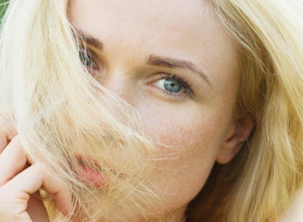 Woman covering face with hair, portrait, Image: 295623499, License: Rights-managed, Restrictions: , Model Release: no, Credit line: Profimedia, PhotoAlto