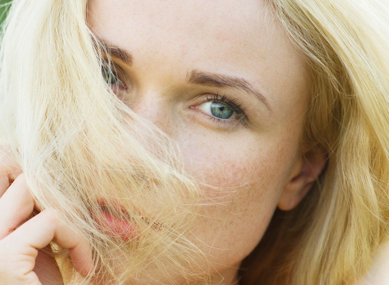 Woman covering face with hair, portrait, Image: 295623499, License: Rights-managed, Restrictions: , Model Release: no, Credit line: Profimedia, PhotoAlto