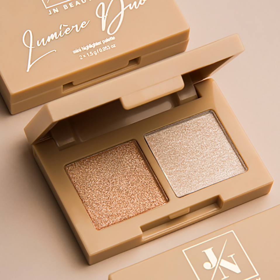 Lumière Duo Mini Highlighter Palette u bež pakiranju s dvije sjajne nijanse