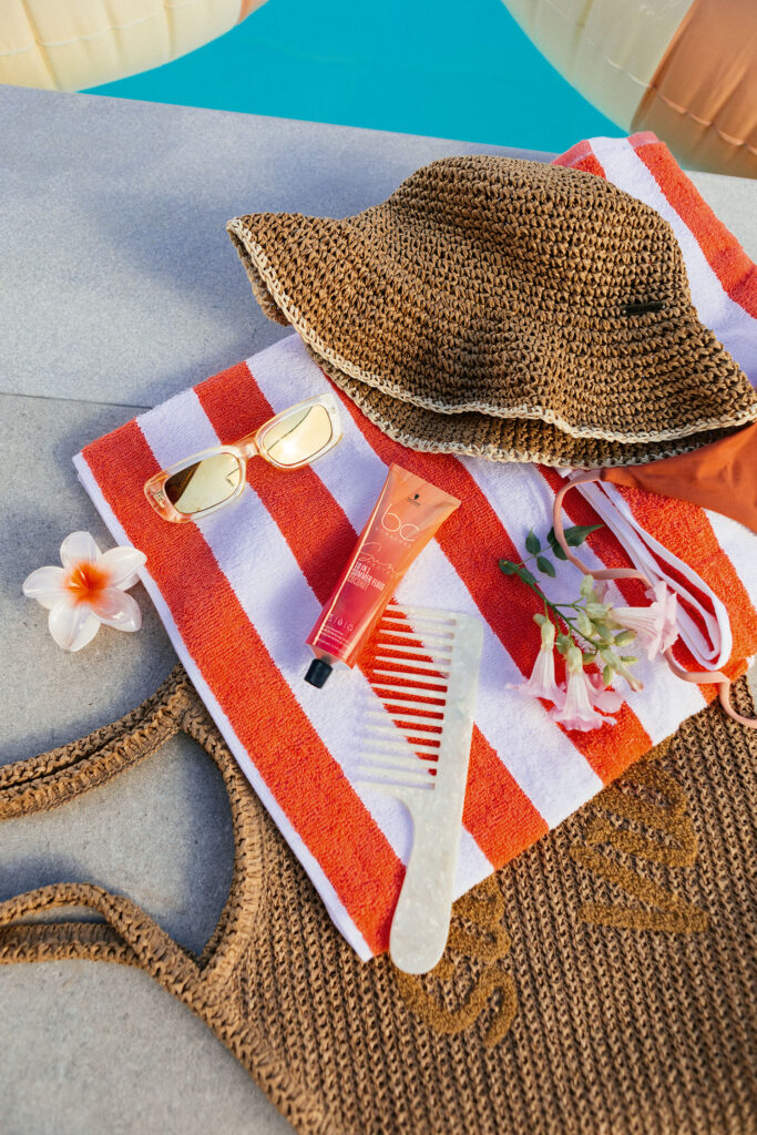 Bonacure Sun Protect 10-in-1 Summer Fluid uz ljetne modne dodatke, šešir i ručnik za plažu